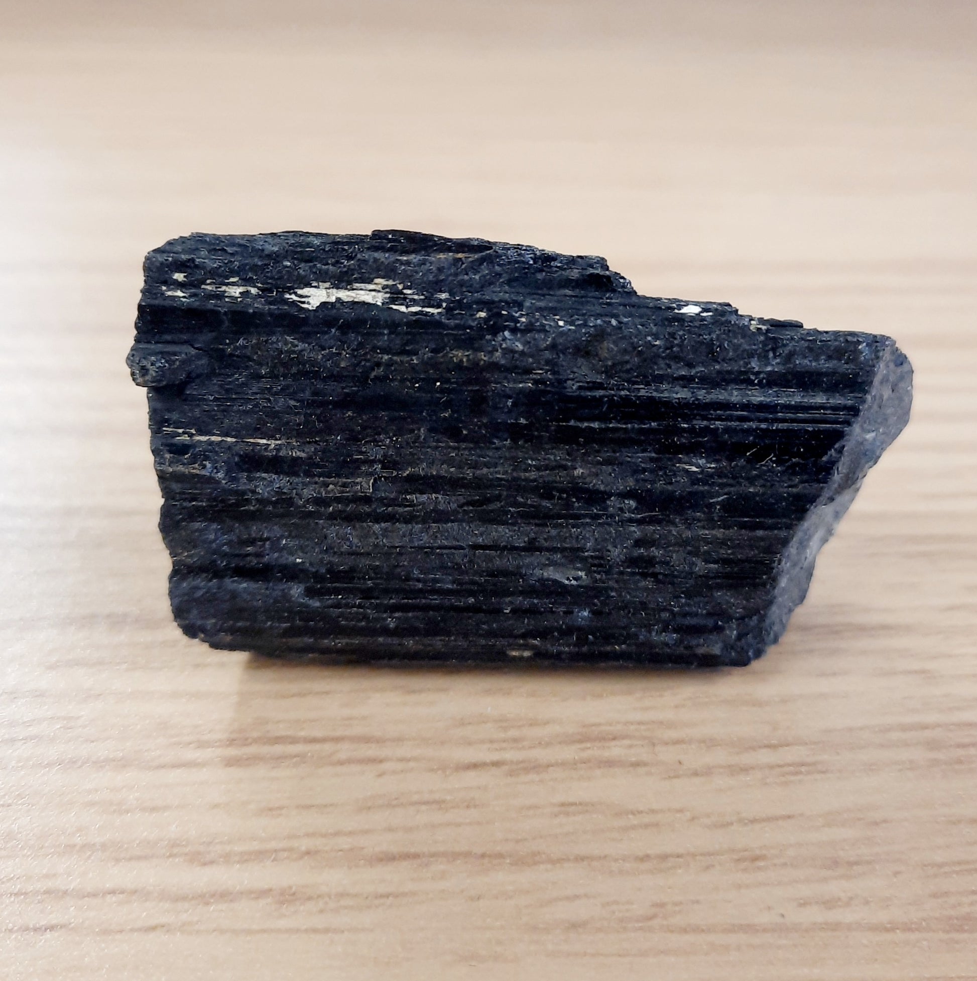 Rough black tourmaline specimen crystals