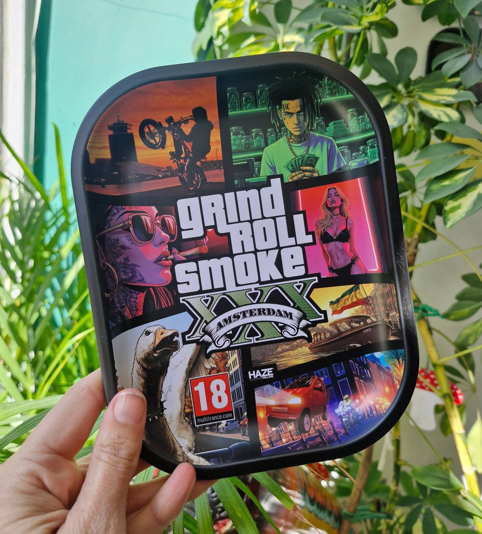 Haze Holland Grind Roll Smoke V small rolling tray with Amsterdam comic-style artwork